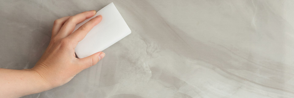 Our miracle sponge conjures away stains on the wall in one move!